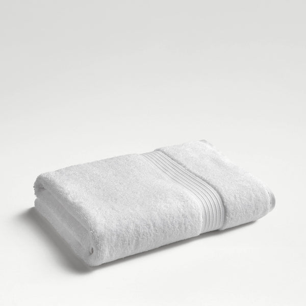 Christy Supreme Hygro Supima cotton bath sheet in white, folded on a pale background