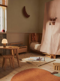 ferm LIVING Skye parchment rug shown from an angle showing pile texture