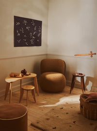 Close-up of the ferm LIVING Skye rug's hand-tufted wool pile and star detail