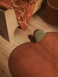 Detail of the ferm LIVING Skye blanket's brushed cotton texture and stitched edge