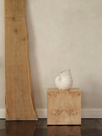 Detail of the ferm LIVING Shell Vase matte off-white stoneware surface
