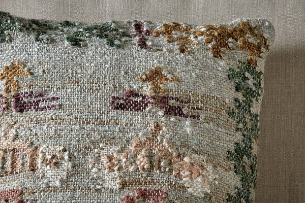 Dantri soft grey jute and cotton cushion cover, close-up of woven floral pattern