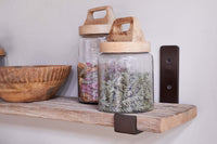 Close-up of the reclaimed wood and iron bracket on the Ibo shelf