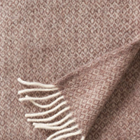 Close-up of the Klippan Lima sand throw showing the diamond weave and fibre detail