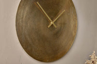 Okota large antique brass wall clock shown at an angle