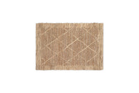 Vandi natural jute doormat corner detail on a stone floor